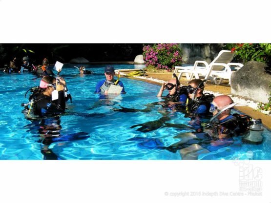 PADI Instructor Course candidates listening to a Confined Water Teaching presentation briefing