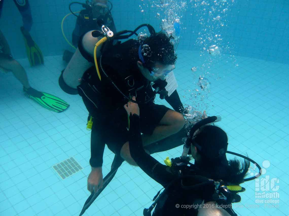 Instructors demonstrating very good control in confined water