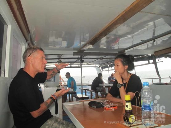 PADI Underwater Navigation Dive briefing on the boat before the first dive