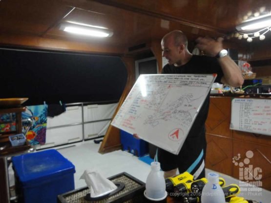 Night Dive briefing on the boat before gearing up
