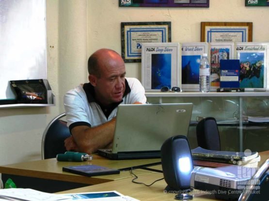 PADI Course Director Chris Owen thinking at work during a PADI IDC with Indepth Phuket