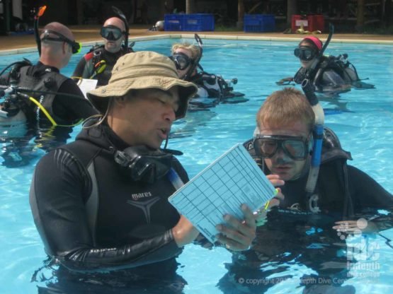 PADI OWSI Candidate getting his Confined Water Presentation Scored