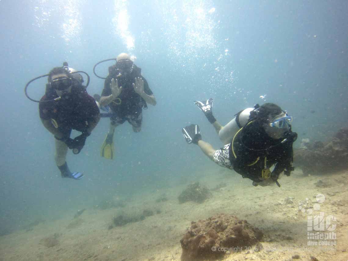 Divemaster guiding certified divers at Racha Yai Island