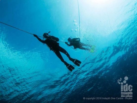 Scuba Divers descending down a line on a PADI Deep Diver Course