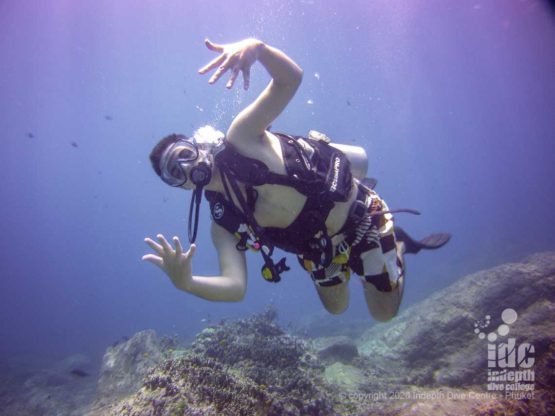 Happy diver at Homerun Reef dive site Racha Yai Island