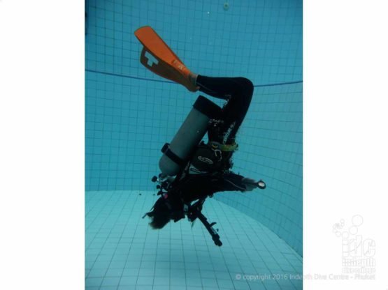 Student Diver hovering upside with Indepth