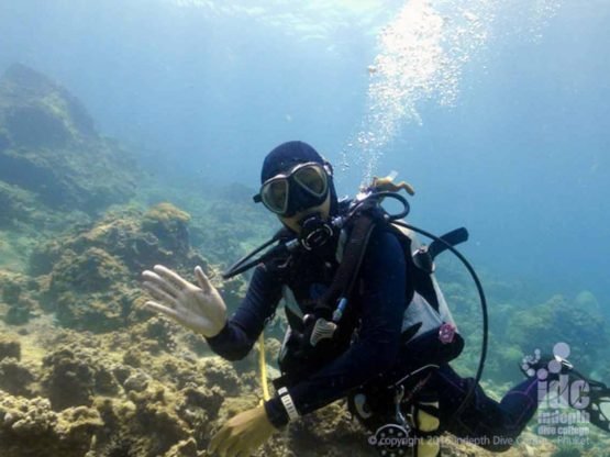 Happy diver at Turtle Wall - Diving Phi Phi islands