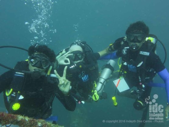 Poseidon Se7en Rebreather diver and buddies on their PADI Master Scuba Diver final dive