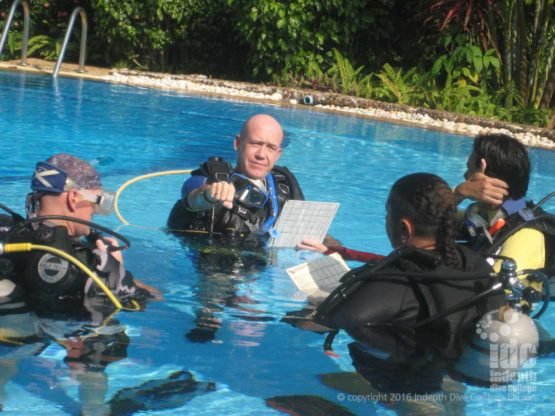 IDC Staff receive feedback from the PADI Course Director