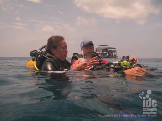 PADI Rescue Diver breathing at the surface with Pocket Mask